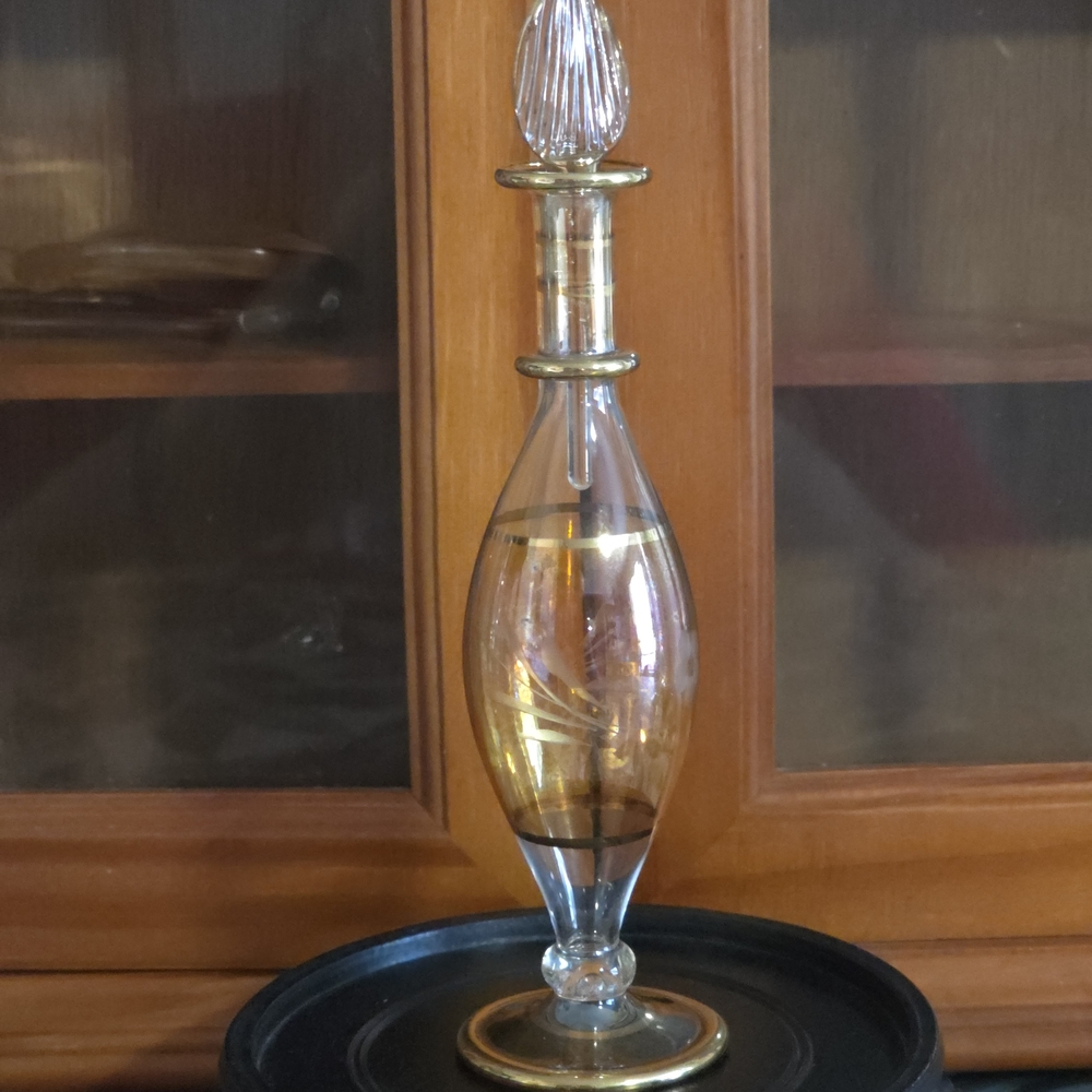 Elegant Glass Perfume Bottle with Gold Accents